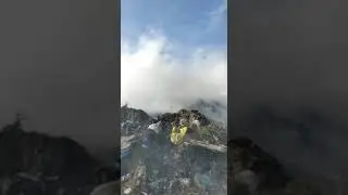 Arde groapa de gunoi de la Cogealac