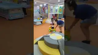 Raya playing on car at kids' paradise