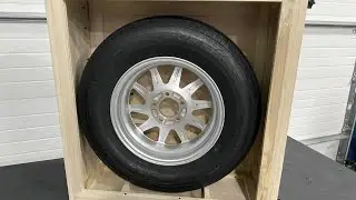CARGO TRAILER WORK STATION HIDING SPARE TIRE, WIRING TOWER AND FLOOR L TRACK HARDWARE.