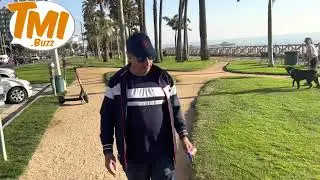 Jon Lovitz looking pretty sporty as he takes his dog for a late afternoon walk