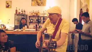 Singer-songwriter Kevin Sysyn plays acoustic tunes at The Blue Veranda, Phnom Penh, Cambodia