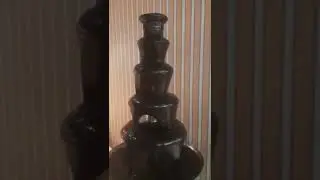 Sizzling Chocolate fountain with berries