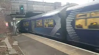 ScotRail class 320 and 318 departing Dalmuir for Airdrie