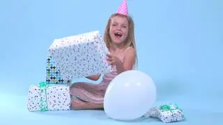 Ava Unwraps a Personalised Children's Book from In The Book