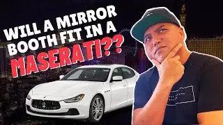 Loading a Mirror Photo Booth in a Maserati