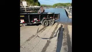 Dump trailer Launches boat