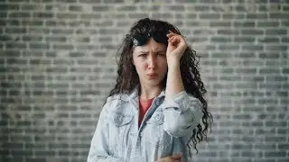 Portrait of Beautful Trendy Girl Raising Sunglasses Staring Looking Surprised | Stock Footage -