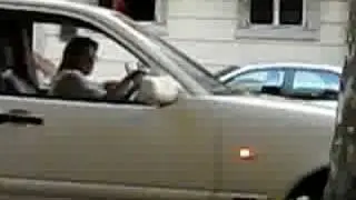 Extremely drunk guy gets water poured on his head