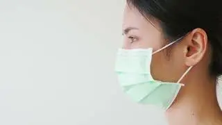 woman wearing a mask | 4K Footage