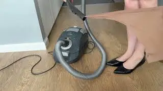 Cleaning home in stockings 
