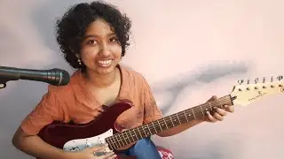 At the foot of the cross cover by Ronia Ranjit