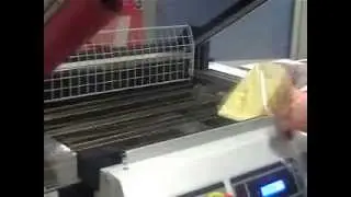 Machine sous film rétractable à cloche avec tapis motorisé "RP 55 A" (MINIPACK) Belgique Luxembourg