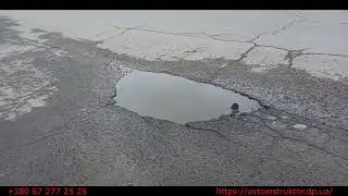 Мираж на дороге среди луж