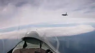 TWO RUSSIAN SU-27 INTERCEPT NATO F-16 ABOVE THE BALTIC SEA