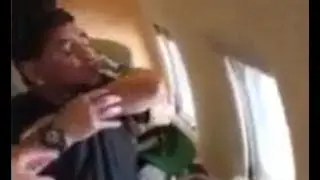 HILARIOUS! Diego Maradona drinking vodka with Russians in private jet!