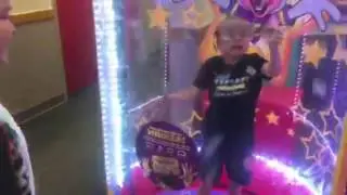 Emmitt in the ticket blaster at Chuck E Cheese!