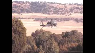 Apache helicopter (AH 64) hovering at Fort Carson Colorado