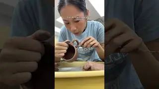 Trimming and adding a handle to this mug #ceramic #pottery #art #short