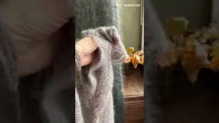 Ажурный пуховый жилет в технике паутинки 