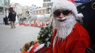 Alex has been sleeping rough in London for 9 years. He dresses up as Santa to panhandle.