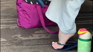 Candid perfect asian feet in flip flops at the airport (no sound)