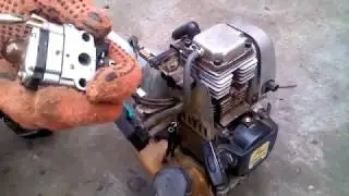 Chinese brush cutter. Works poorly. No traction. Valve clearance.