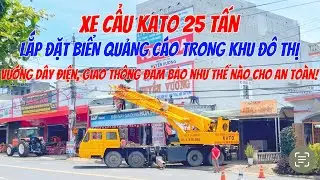 Xe cẩu KATO 25T lắp đặt biển quảng cáo trong khu đô thị như thế nào khi vướng dây điện và mặt bằng ?