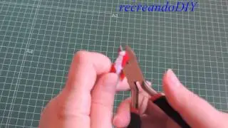 Como hacer un baston de caramelo con  limpiapipas.