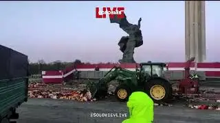 скоты! рига .бульдозером смели все цветы принесенные к 9 мая  к памятнику воинам освободителям