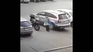 Woman Droping Someone’s Motorcycle