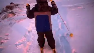 Катание на лыжах.