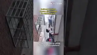 Delivery workers rescue girl trapped in window grate