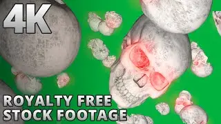 4K Halloween Skulls Falling Scary Glowing Eyes - Stock Footage Green Screen Loopable Royalty Free