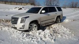 cadillac escalade platinum по снегу в горку