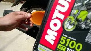 Замена моторного масла, на Honda Tact AF-75 2015 года. OIL 650 мл