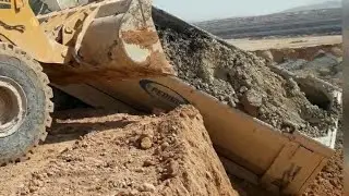 Kawasaki 95z7 loder ucuruma kayan kamyonu tutuyor ve bu işler hiç bir zaman hafife alınmaz