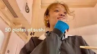 Eating 50 plates of sushi with friends
