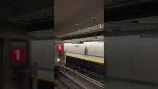Subway train coming in the World Trade Center station.