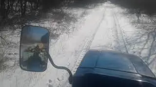 вожу дровишки по снежку на мототракторе