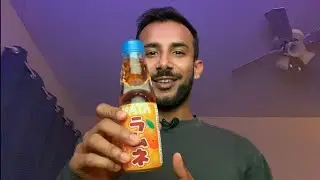 ASMR — drinking orange ramune japanese soda from a glass bottle