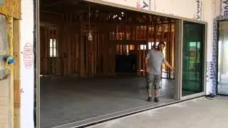 Western moving glass wall system