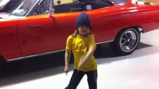 Crazy redhead making her own dance moves!