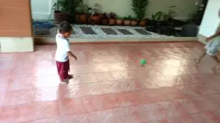 Tommy footballing with a very little ball.