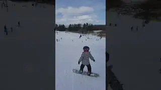 Belle Yang snowboarding