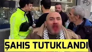 Hilafet Bayrağı Açan adama Yumruk atan şahıs tutuklandı.