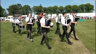 Meldrum Academy Pipe Band march off playing 