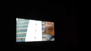 Child running about having fun on the tv
