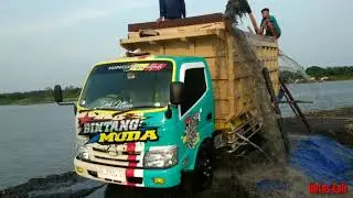 New, truk hino dutro muat pasir progo