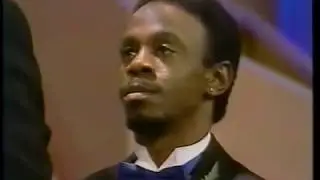 Marriage of gay black men on Phil Donahue Show, serenaded by The Flirtations