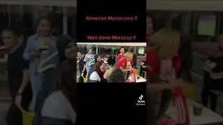 Moroccans celebrate as Ashraf Hakimi scores the final penalty for Morocco vs. Spain